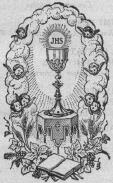 image of the Chalice and the Host with the Bible in front